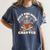 Just One More Chapter Skeleton Reading Book Lover Women's Comfort Colors T-Shirt Moss