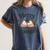 Merry And Booked Holiday Reading Winter Book Lover Premium Tri-Blend Women's Comfort Colors T-Shirt Moss