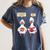 How Many Nights Reading Goose Book Lover Reader Women's Comfort Colors T-Shirt Moss