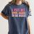 I Put My Book Down To Be Here Book Lover Book Nerd Women's Comfort Colors T-Shirt Moss