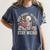 Read Books Be Kind Stay Weird Skeleton Reading Book Women's Comfort Colors T-Shirt Moss