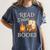 Read S'More Books Campfire Reading Book Lovers Camper Women's Comfort Colors T-Shirt Moss