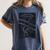 Reading Between The Timelines Time Travel Books Women's Comfort Colors T-Shirt Moss