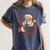 He Sees What You'Ve Been Reading Bookish Christmas Humor Women's Comfort Colors T-Shirt Moss He Sees What You'Ve Been Reading Bookish Christmas Humor Women's Comfort Colors T-Shirt Moss