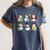 Snowman Reading Books Teacher Christmas Librarian Bookworm Women's Comfort Colors T-Shirt Moss Snowman Reading Books Teacher Christmas Librarian Bookworm Women's Comfort Colors T-Shirt Moss