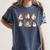 Spooky Teacher Halloween Ghost Reading Book Trick Or Treat Women's Comfort Colors T-Shirt Moss