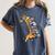 Teacher Shirt Giraffe Holding Books Bookworm Librarian Women's Comfort Colors T-Shirt Moss Teacher Shirt Giraffe Holding Books Bookworm Librarian Women's Comfort Colors T-Shirt Moss
