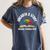 Unearth a Story 2026 Summer Reading Program Tree Book Women's Comfort Colors T-Shirt Moss Unearth a Story 2026 Summer Reading Program Tree Book Women's Comfort Colors T-Shirt Moss