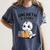 Unearth a Story Cute Dinosaur Summer Reading 2026 Dino Book Women's Comfort Colors T-Shirt Moss