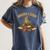 Unearth a Story Dinosaur Reading Books Summer 2026 Women's Comfort Colors T-Shirt Moss