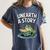 Unearth a Story Frog Reading a Book Summer 2026 Premium Tri-Blend Women's Comfort Colors T-Shirt Moss Unearth a Story Frog Reading a Book Summer 2026 Premium Tri-Blend Women's Comfort Colors T-Shirt Moss