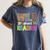 Wild About Reading Library Day Reading Books & Bookworm Women's Comfort Colors T-Shirt Moss