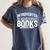 Women's Introverted But Willing To Discuss Books Women's Comfort Colors T-Shirt Moss