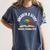 Women's Unearth a Story 2026 Summer Reading Program Tree Book Women's Comfort Colors T-Shirt Moss Women's Unearth a Story 2026 Summer Reading Program Tree Book Women's Comfort Colors T-Shirt Moss