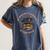 In A World Full Of Bookworms Be A Book Dragon Book Lover Women's Comfort Colors T-Shirt Moss