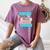 Threadless Grey Sky Chai Trans Book Pride Graphic Women's Comfort Colors T-Shirt Blue Jean
