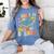i Survived My Daughter's Bachelors Degree Groovy Graduation Women's Comfort Colors T-Shirt Blue Jean