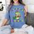 All Booked For Mardi Gras Crocodile Reading Book Teacher Women's Comfort Colors T-Shirt Chalky Mint