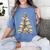 Christmas Book Tree Teacher Book Lover Xmas Librarian Women's Comfort Colors T-Shirt Chalky Mint Christmas Book Tree Teacher Book Lover Xmas Librarian Women's Comfort Colors T-Shirt Chalky Mint