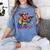 Rainbow Pride Bigfoot Reading Book With Heart Glasses Women's Comfort Colors T-Shirt Chalky Mint