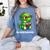 Readasaurus Reading Dinosaur Book Reader Bookworm Women's Comfort Colors T-Shirt Chalky Mint