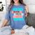 Threadless Grey Sky Chai Trans Book Pride Graphic Women's Comfort Colors T-Shirt Chalky Mint