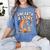 Unearth A Story Rainbow Treasure Book Women's Comfort Colors T-Shirt Chalky Mint Unearth A Story Rainbow Treasure Book Women's Comfort Colors T-Shirt Chalky Mint