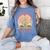 Women's Unearth a Story 2026 Summer Reading Program Flowers Book Women's Comfort Colors T-Shirt Chalky Mint