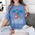 In A World Full Of Bookworms Be A Book Dragon Reading Women's Comfort Colors T-Shirt Chalky Mint