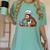 Bigfoot Reading a Cookbook Women's Comfort Colors T-Shirt Violet Bigfoot Reading a Cookbook Women's Comfort Colors T-Shirt Violet