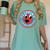 Clifford The Big Red Dog Round Distressed Logo Kids Books Women's Comfort Colors T-Shirt Violet
