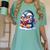 Penguin Reading a Book Animal Women's Comfort Colors T-Shirt Violet