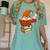 Reading Lover Book Graphic Gnome Women's Comfort Colors T-Shirt Violet Reading Lover Book Graphic Gnome Women's Comfort Colors T-Shirt Violet