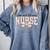 Labor And Delivery Nurse Stethoscope Coquette Bow Graduation Comfort Colors Sweatshirt Blue Jean