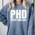 PHD Pretty Huge Debt Doctoral Degree PHD Graduation Comfort Colors Sweatshirt Blue Jean