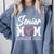 Senior Mom Class Of 2026 Graduation Premium Tri-Blend Comfort Colors Sweatshirt Blue Jean