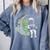 Astronaut Reading Book To Alien Moon Space Women Kids Men Premium Tri-Blend Comfort Colors Sweatshirt Denim Astronaut Reading Book To Alien Moon Space Women Kids Men Premium Tri-Blend Comfort Colors Sweatshirt Denim
