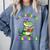 All Booked For Mardi Gras Crocodile Reading Book Teacher Comfort Colors Sweatshirt Denim
