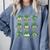 Cute Shamrock Reading Books St Patrick's Day Teacher Reading Comfort Colors Sweatshirt Denim