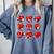 Heart Reading Books Valentine’s Day Girl And Boy Book Lovers Comfort Colors Sweatshirt Denim Heart Reading Books Valentine’s Day Girl And Boy Book Lovers Comfort Colors Sweatshirt Denim