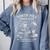North Pole Book Club Christmas Elf Bookish Retro Graphic Comfort Colors Sweatshirt Denim North Pole Book Club Christmas Elf Bookish Retro Graphic Comfort Colors Sweatshirt Denim