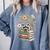 Raccoon Books Reading Flowers Comfort Colors Sweatshirt Denim Raccoon Books Reading Flowers Comfort Colors Sweatshirt Denim