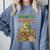 Unearth a Story Triceratops Dinosaur Reading Books Cute Dino Comfort Colors Sweatshirt Denim