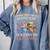 A Woman Cannot Survive On Books Alone She Needs Yarn Crochet Premium Tri-Blend Comfort Colors Sweatshirt Denim