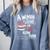A Woman Cannot Survive On Books Alone She Also Needs Yarn Premium Comfort Colors Sweatshirt Denim