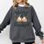 Merry And Booked Holiday Reading Winter Book Lover Premium Tri-Blend Comfort Colors Sweatshirt Pepper