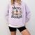 Merry And Booked Holiday Reading Winter Book Lover Premium Tri-Blend Comfort Colors Sweatshirt Crimson