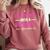 Doctoral Degree Graduation Woman With a Doctorate Comfort Colors Sweatshirt Crimson