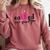 Earned Not Given Nurse Graduation Comfort Colors Sweatshirt Crimson