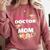 My Favorite Doctor Calls Me Mom Graduation Comfort Colors Sweatshirt Crimson